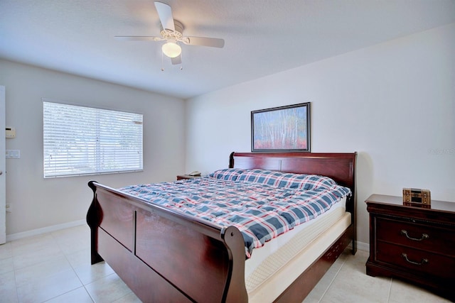 3782 Rollingsford Cir, Lakeland, FL 33810 - bedroom featuring light tile patterned flooring and a ceiling fan