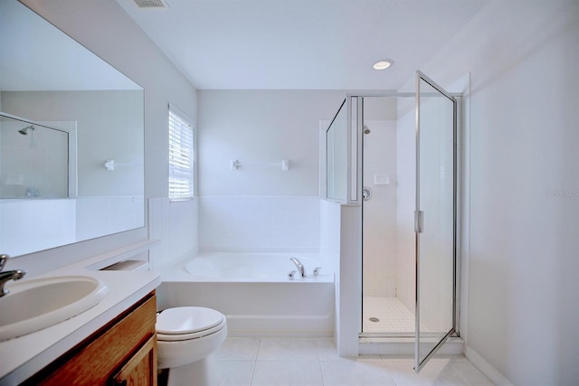 3782 Rollingsford Cir, Lakeland, FL 33810 - full bath with vanity, a bath, a stall shower, and tile patterned floors