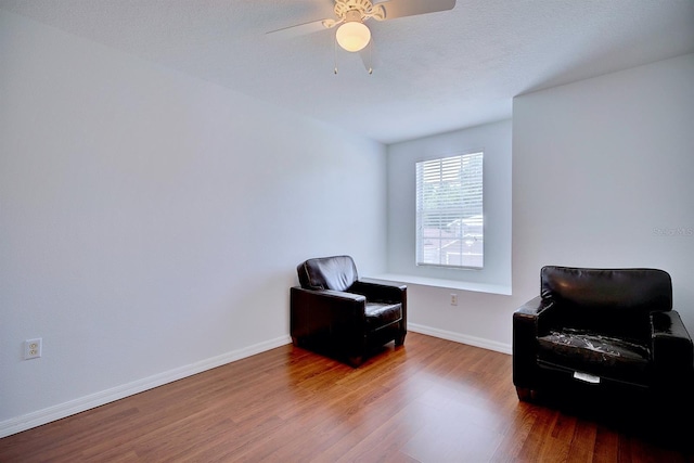 3782 Rollingsford Cir, Lakeland, FL 33810 - living area featuring wood finished floors and ceiling fan