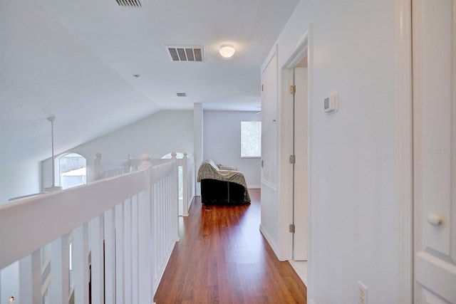 3782 Rollingsford Cir, Lakeland, FL 33810 - corridor with wood finished floors, healthy amount of natural light, and vaulted ceiling