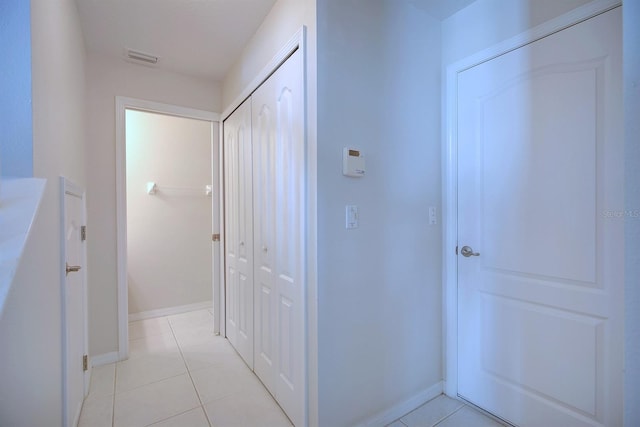 3782 Rollingsford Cir, Lakeland, FL 33810 - corridor featuring light tile patterned floors