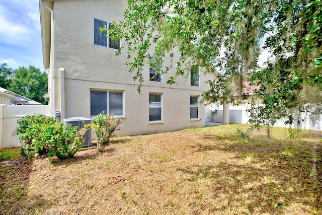 3782 Rollingsford Cir, Lakeland, FL 33810 - back of house featuring stucco siding