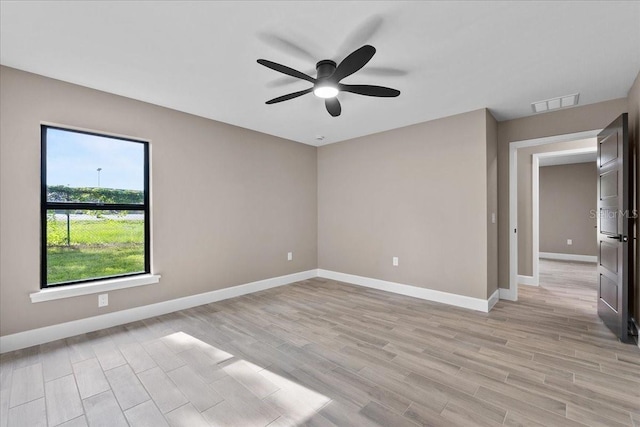3063 Lantana Cir, Auburndale, FL 33823 - empty room with light wood-style floors and a ceiling fan