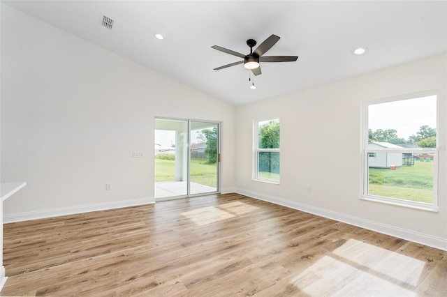 724 Voight Ave N, Fort Meade, FL 33841 - spare room with light wood-style flooring, vaulted ceiling, a ceiling fan, and recessed lighting