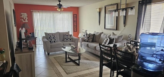 5627 Blue Shadows Ct Unit 3, Orlando, FL 32811 - living area with plenty of natural light, ceiling fan, and light tile patterned flooring