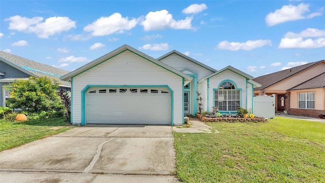 526 Allison Ave, Davenport, FL 33897 - ranch-style house with concrete driveway, a garage, and a front yard