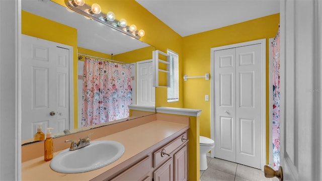 526 Allison Ave, Davenport, FL 33897 - full bathroom featuring tile patterned floors, vanity, a shower with curtain, and a closet