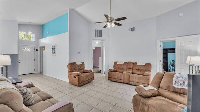 526 Allison Ave, Davenport, FL 33897 - living area featuring high vaulted ceiling, ceiling fan, and light tile patterned floors