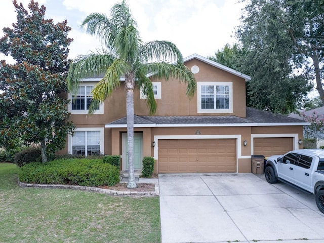 1911 Wind Meadows Dr, Bartow, FL 33830 - view of front of house with stucco siding, driveway, a shingled roof, an attached garage, and a front lawn