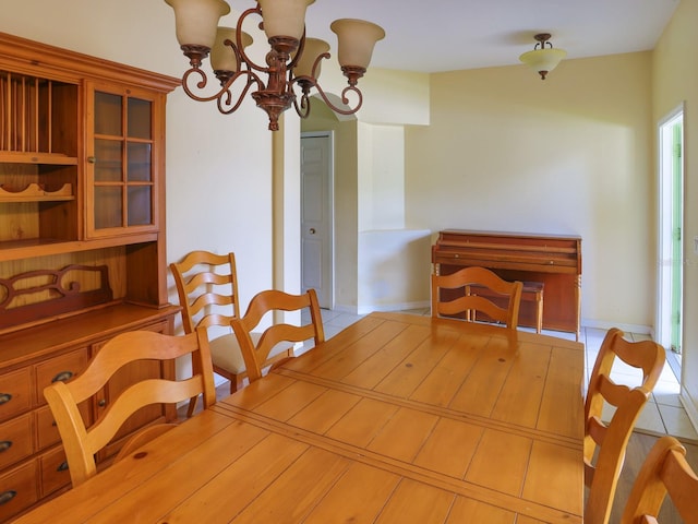 1911 Wind Meadows Dr, Bartow, FL 33830 - dining room with a chandelier and tile patterned floors