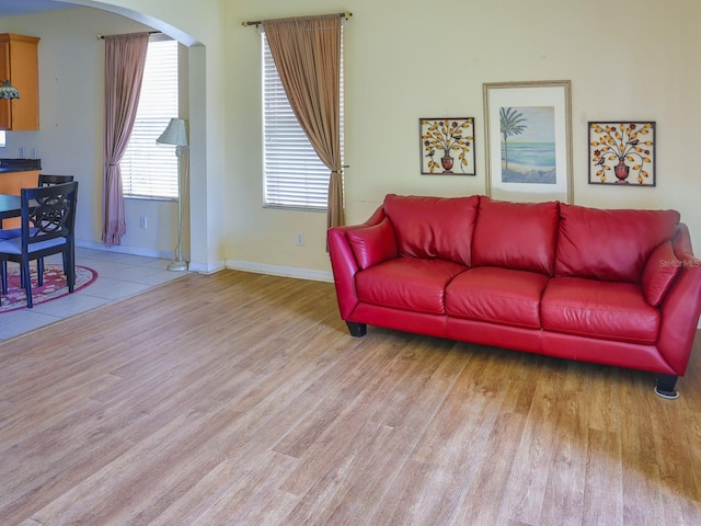 1911 Wind Meadows Dr, Bartow, FL 33830 - living room with wood finished floors and arched walkways