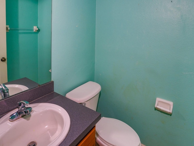 1911 Wind Meadows Dr, Bartow, FL 33830 - half bathroom featuring toilet and vanity