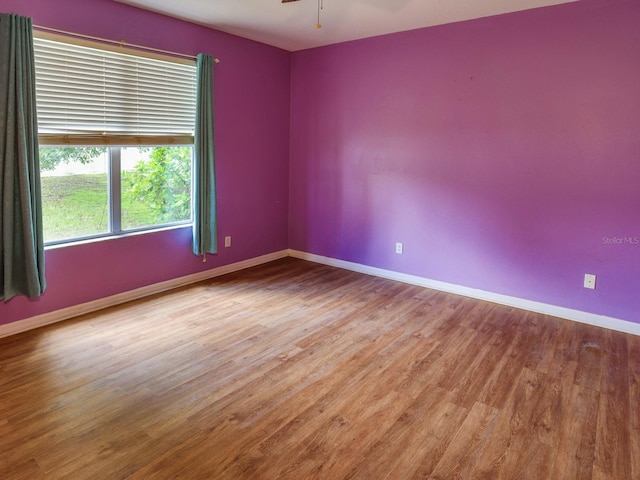 1911 Wind Meadows Dr, Bartow, FL 33830 - unfurnished room with wood finished floors and ceiling fan
