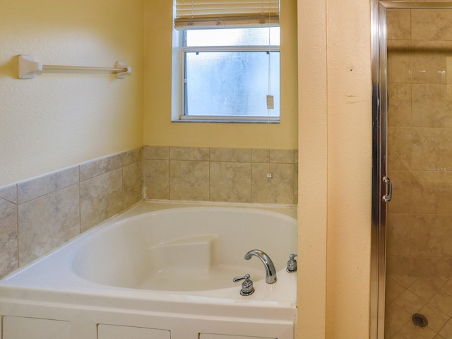 1911 Wind Meadows Dr, Bartow, FL 33830 - full bathroom with a garden tub and a shower stall