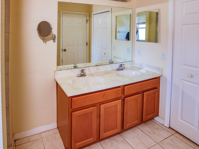 1911 Wind Meadows Dr, Bartow, FL 33830 - bathroom with double vanity and tile patterned flooring
