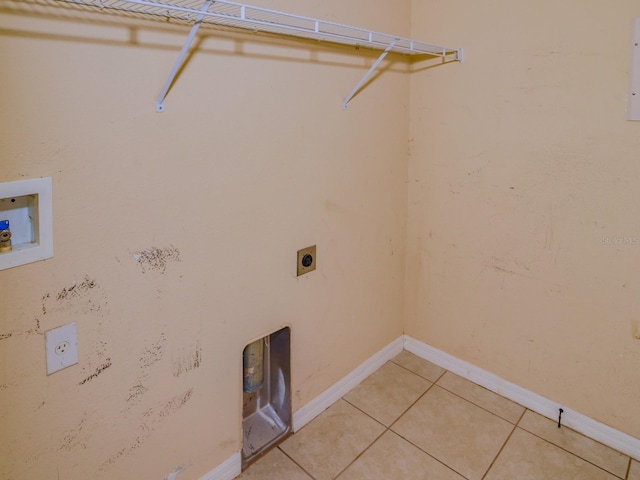 1911 Wind Meadows Dr, Bartow, FL 33830 - washroom featuring electric dryer hookup, washer hookup, and light tile patterned floors