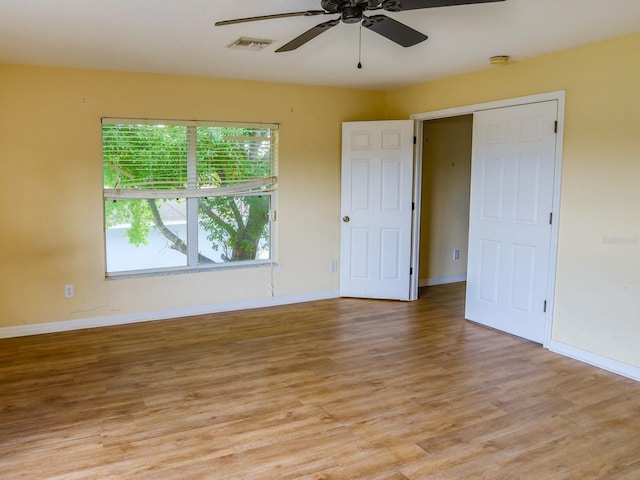 1911 Wind Meadows Dr, Bartow, FL 33830 - empty room with a ceiling fan and light wood-style floors