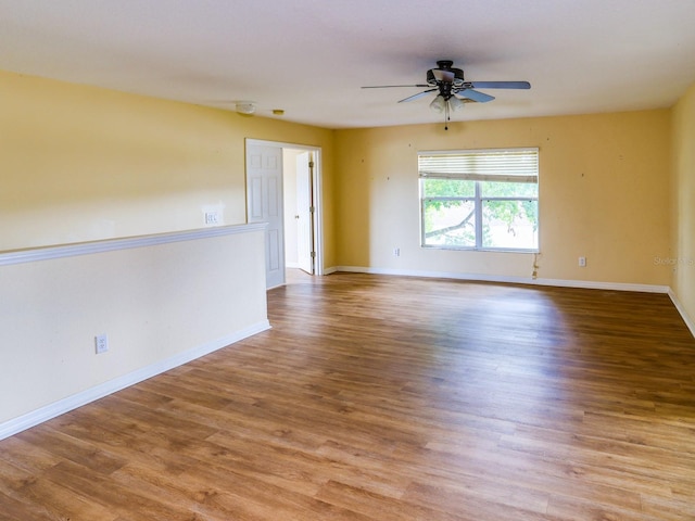 1911 Wind Meadows Dr, Bartow, FL 33830 - spare room with a ceiling fan and wood finished floors