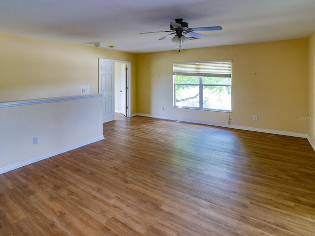 1911 Wind Meadows Dr, Bartow, FL 33830 - unfurnished room featuring ceiling fan and wood finished floors