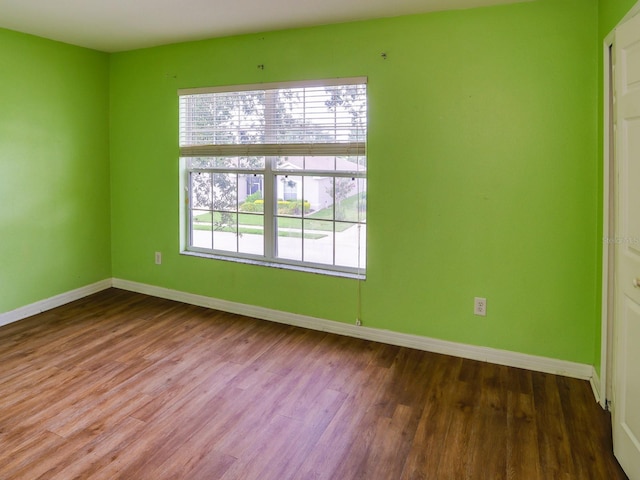 1911 Wind Meadows Dr, Bartow, FL 33830 - unfurnished room featuring baseboards and wood finished floors