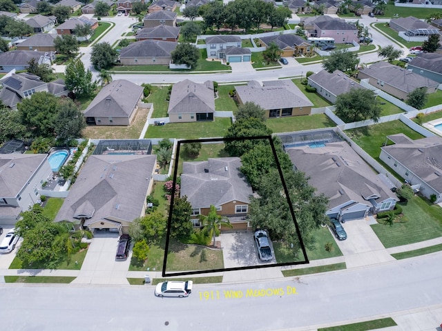 1911 Wind Meadows Dr, Bartow, FL 33830 - aerial view of residential area featuring property boundaries highlighted