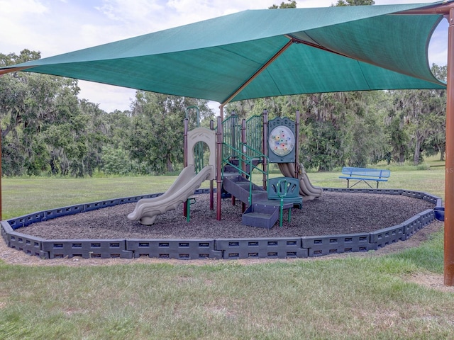 1911 Wind Meadows Dr, Bartow, FL 33830 - communal playground featuring a yard