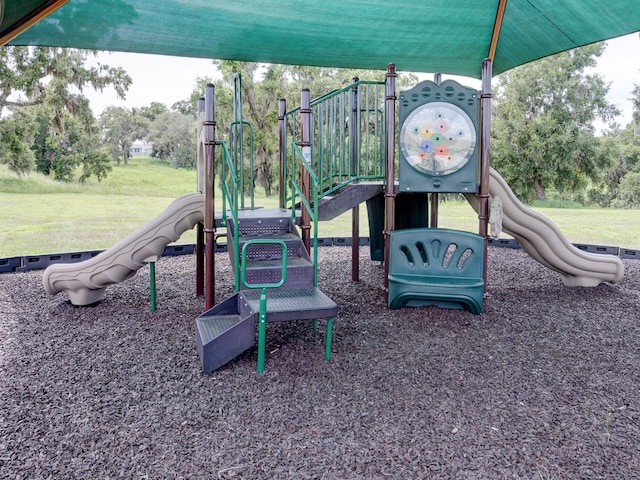 1911 Wind Meadows Dr, Bartow, FL 33830 - community jungle gym featuring a yard