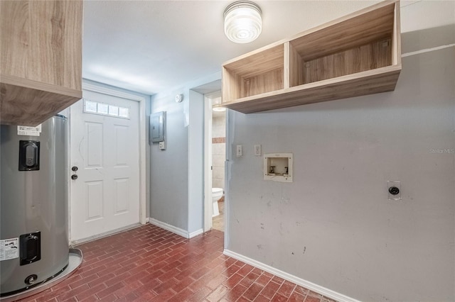 252 W Brookins Ave, Eagle Lake, FL 33839 - entryway featuring water heater, brick patterned flooring, and electric panel
