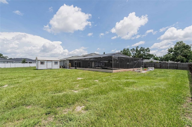 252 W Brookins Ave, Eagle Lake, FL 33839 - fenced backyard with a storage unit and a lanai