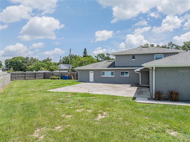 252 W Brookins Ave, Eagle Lake, FL 33839 - fenced backyard featuring a patio area