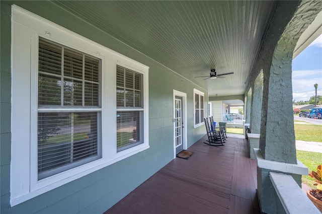 1515 King Ave, Lakeland, FL 33803 - wooden porch with ceiling fan