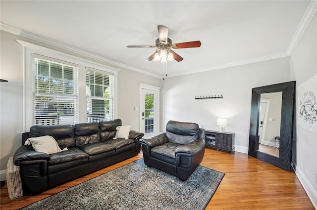 1515 King Ave, Lakeland, FL 33803 - living room with healthy amount of natural light, a ceiling fan, light wood-style flooring, and crown molding