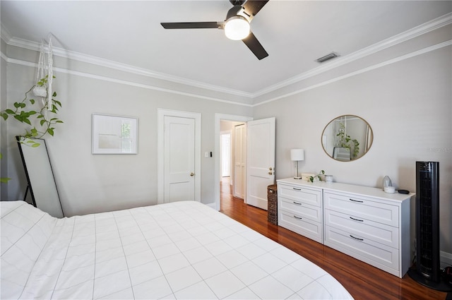 1515 King Ave, Lakeland, FL 33803 - bedroom with crown molding, dark wood finished floors, and a ceiling fan