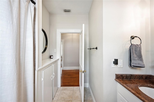 1515 King Ave, Lakeland, FL 33803 - bathroom featuring vanity and baseboards