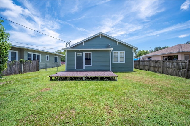 1515 King Ave, Lakeland, FL 33803 - back of house featuring a fenced backyard and a wooden deck
