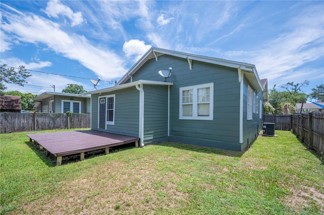1515 King Ave, Lakeland, FL 33803 - back of property featuring a fenced backyard and a deck