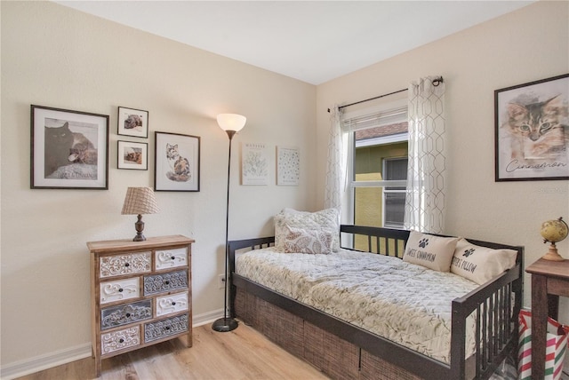 11607 Hammocks Glade Dr, Riverview, FL 33569 - bedroom with wood finished floors and baseboards