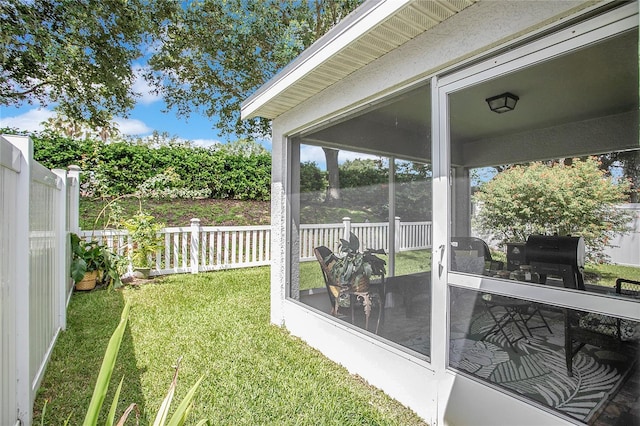 11607 Hammocks Glade Dr, Riverview, FL 33569 - fenced backyard with a sunroom