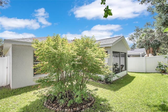 11607 Hammocks Glade Dr, Riverview, FL 33569 - view of yard featuring a sunroom