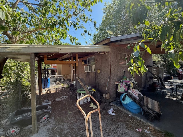 216 Varnadoe Rd, Winter Haven, FL 33880 - rear view of property with cooling unit
