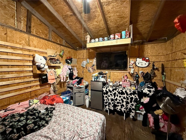 216 Varnadoe Rd, Winter Haven, FL 33880 - bedroom featuring lofted ceiling, freestanding refrigerator, and wood finished floors