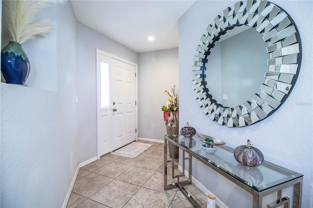 8031 Brookeshire Dr, Lakeland, FL 33809 - tiled entryway with baseboards and recessed lighting