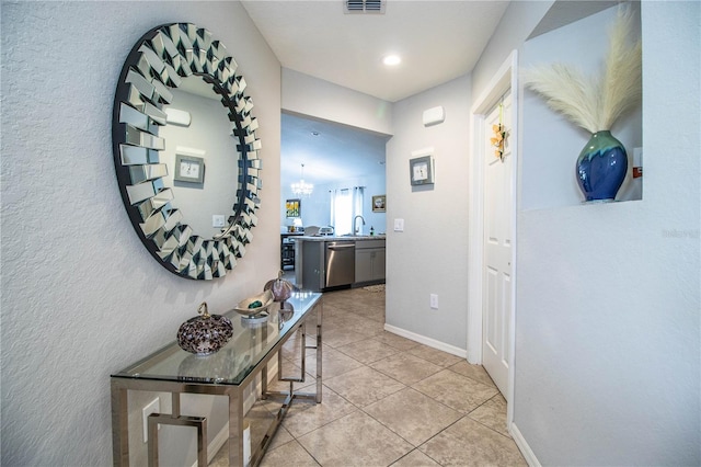 8031 Brookeshire Dr, Lakeland, FL 33809 - hall featuring a sink and light tile patterned floors