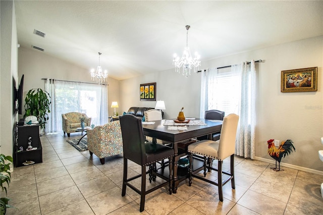 8031 Brookeshire Dr, Lakeland, FL 33809 - dining space with a chandelier, plenty of natural light, light tile patterned floors, and lofted ceiling