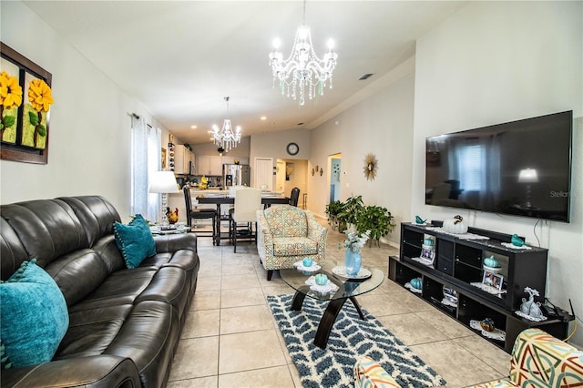 8031 Brookeshire Dr, Lakeland, FL 33809 - living room with a chandelier, vaulted ceiling, and light tile patterned flooring