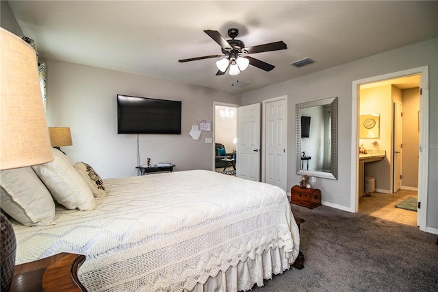 8031 Brookeshire Dr, Lakeland, FL 33809 - bedroom with carpet flooring, a closet, ensuite bath, and ceiling fan