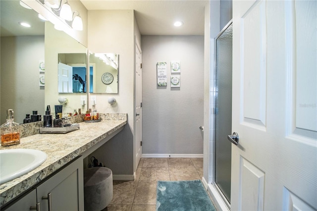 8031 Brookeshire Dr, Lakeland, FL 33809 - bathroom featuring vanity, tile patterned flooring, and a shower stall