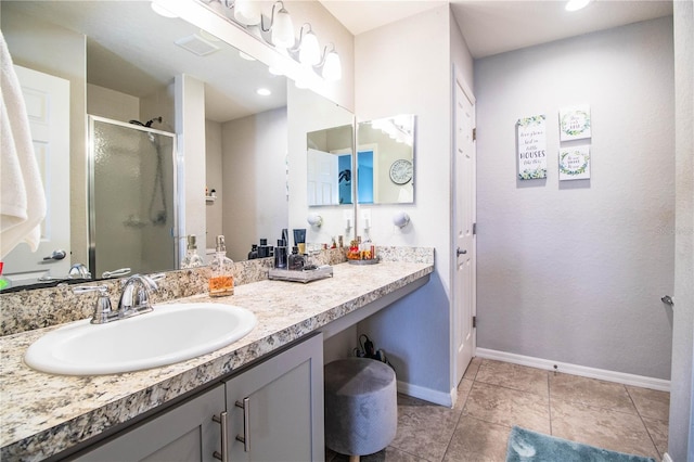 8031 Brookeshire Dr, Lakeland, FL 33809 - full bath featuring a shower stall, vanity, and tile patterned flooring