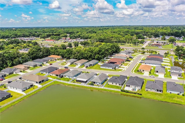 8031 Brookeshire Dr, Lakeland, FL 33809 - aerial perspective of suburban area with a nearby body of water and a forest