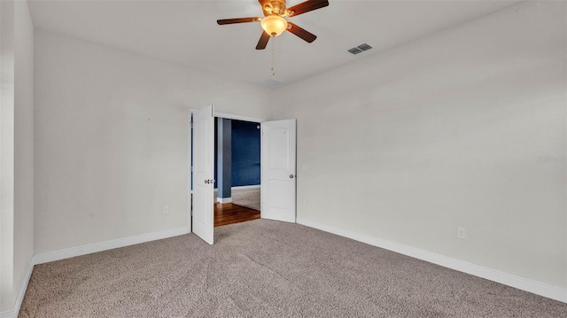 1156 Normandy Heights Cir, Winter Haven, FL 33880 - carpeted spare room with ceiling fan and baseboards